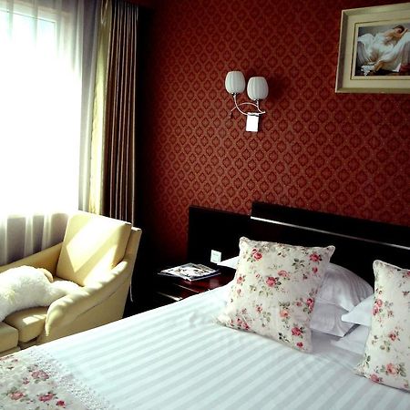 Overseas Chinese International Hotel ชิงเต่า ภายนอก รูปภาพ