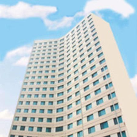 Overseas Chinese International Hotel ชิงเต่า ภายนอก รูปภาพ