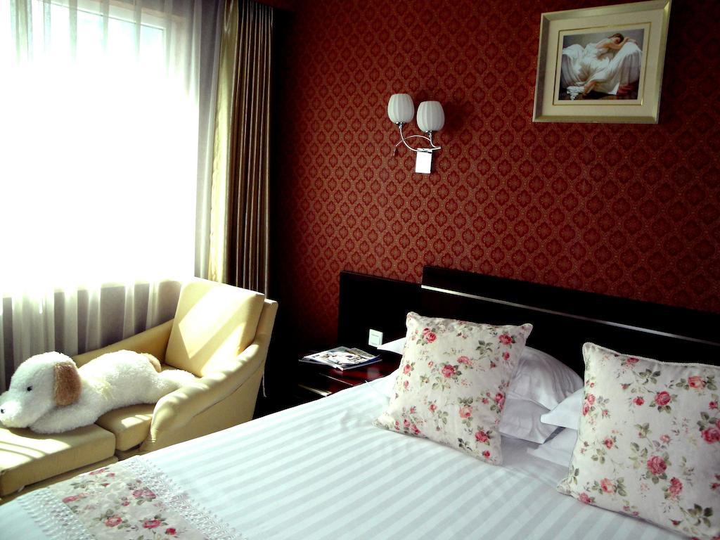 Overseas Chinese International Hotel ชิงเต่า ภายนอก รูปภาพ