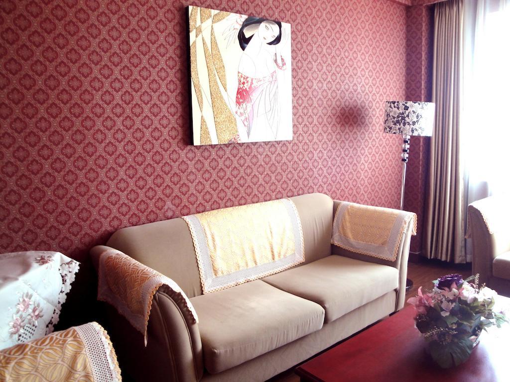 Overseas Chinese International Hotel ชิงเต่า ภายนอก รูปภาพ