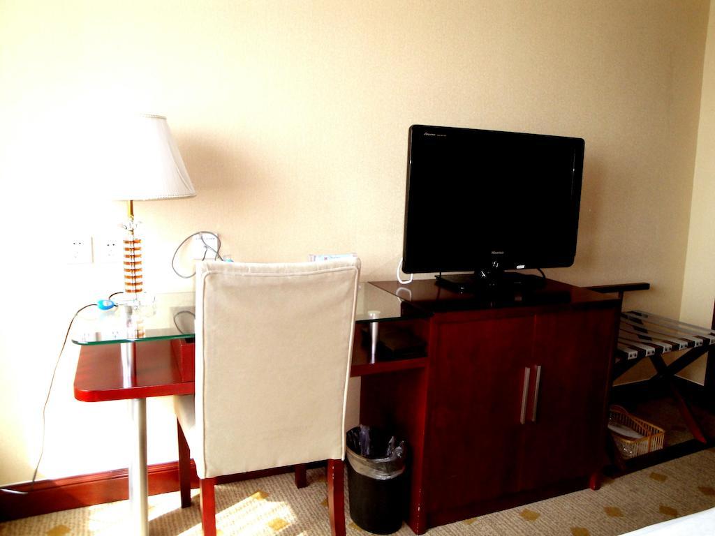 Overseas Chinese International Hotel ชิงเต่า ภายนอก รูปภาพ