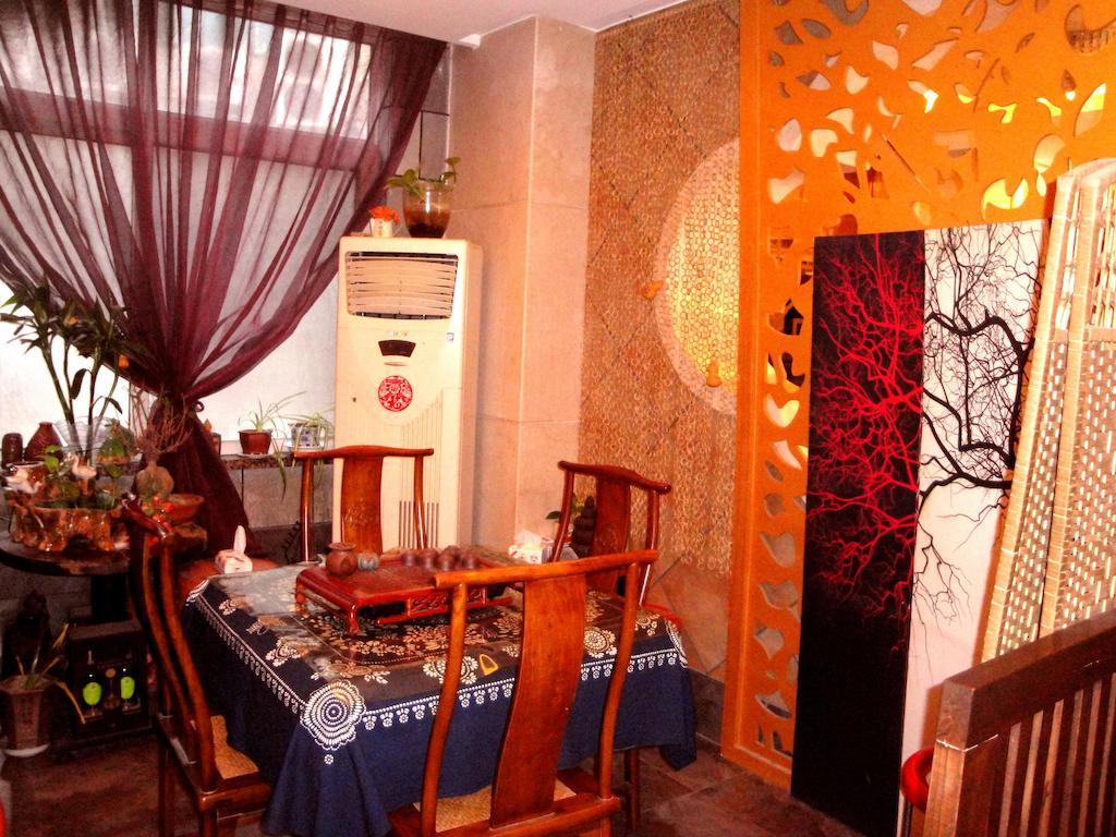 Overseas Chinese International Hotel ชิงเต่า ภายนอก รูปภาพ