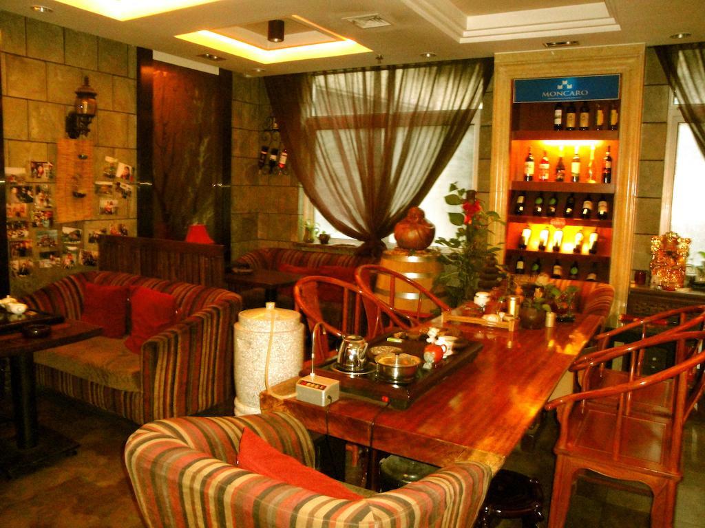 Overseas Chinese International Hotel ชิงเต่า ภายนอก รูปภาพ