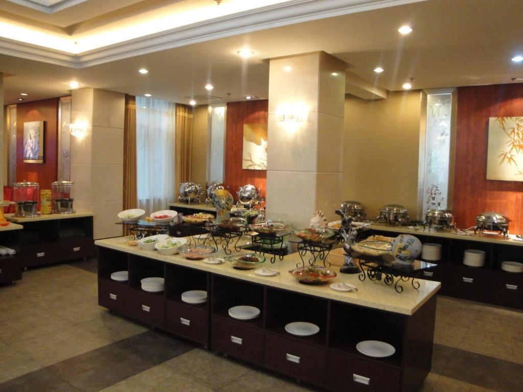 Overseas Chinese International Hotel ชิงเต่า ภายนอก รูปภาพ