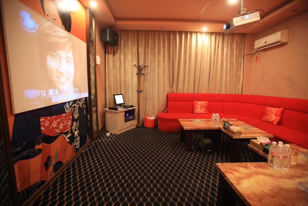 Overseas Chinese International Hotel ชิงเต่า ภายนอก รูปภาพ