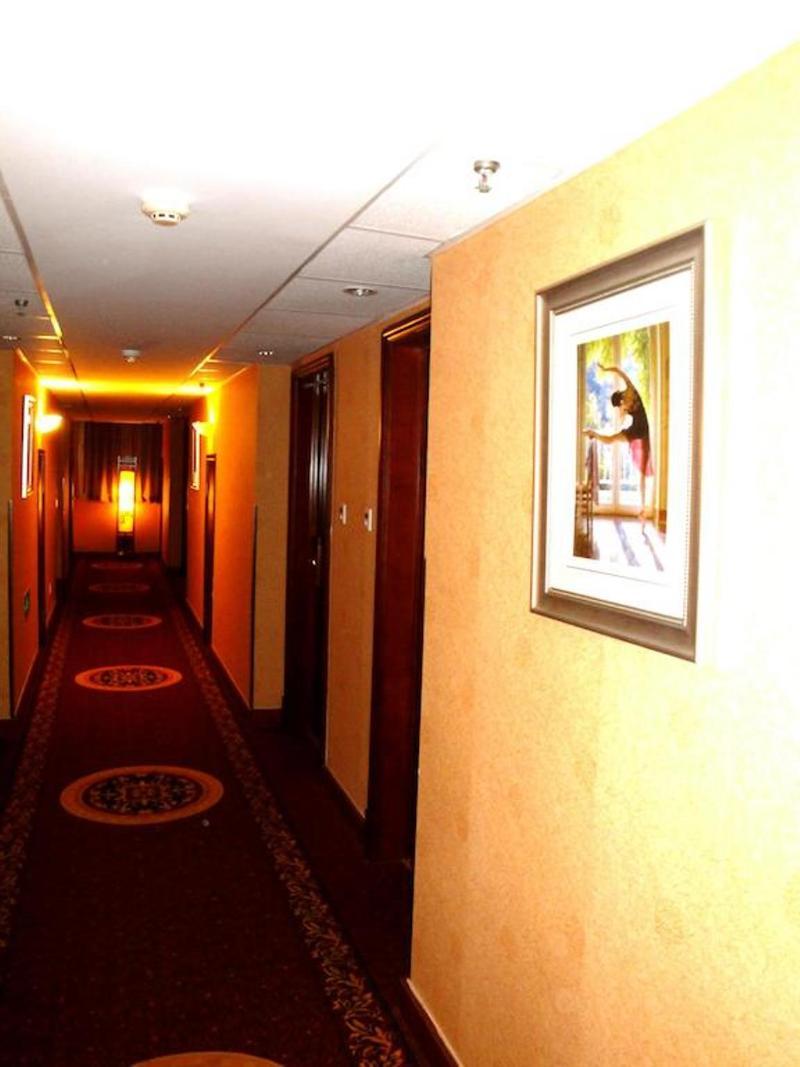 Overseas Chinese International Hotel ชิงเต่า ภายนอก รูปภาพ