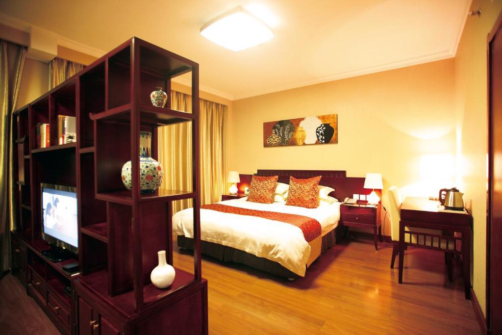 Overseas Chinese International Hotel ชิงเต่า ภายนอก รูปภาพ