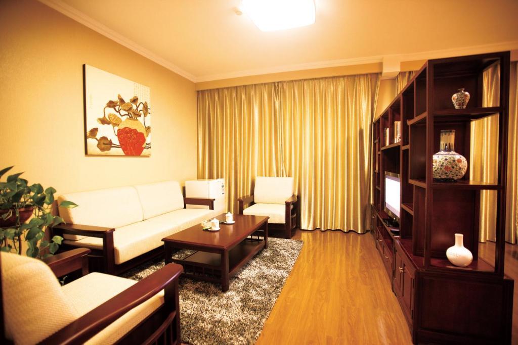Overseas Chinese International Hotel ชิงเต่า ภายนอก รูปภาพ