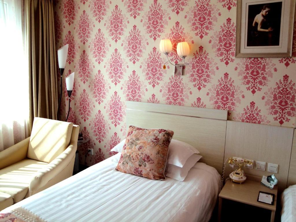 Overseas Chinese International Hotel ชิงเต่า ห้อง รูปภาพ