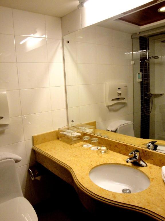 Overseas Chinese International Hotel ชิงเต่า ห้อง รูปภาพ