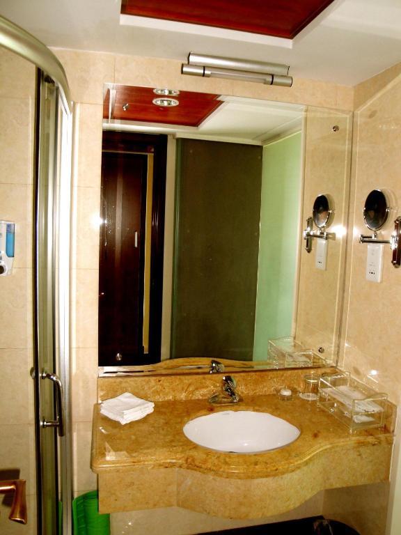 Overseas Chinese International Hotel ชิงเต่า ห้อง รูปภาพ