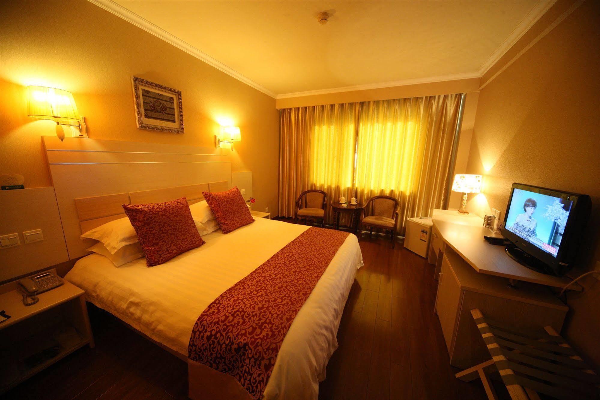 Overseas Chinese International Hotel ชิงเต่า ภายนอก รูปภาพ