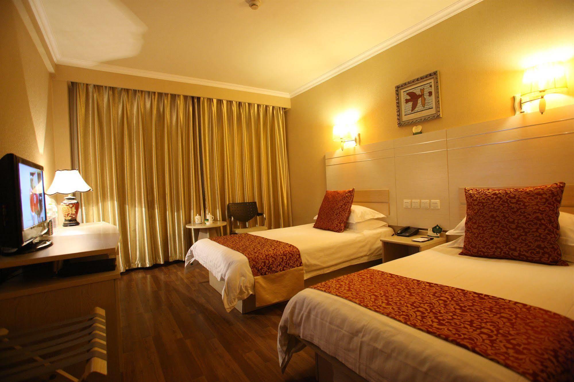 Overseas Chinese International Hotel ชิงเต่า ภายนอก รูปภาพ