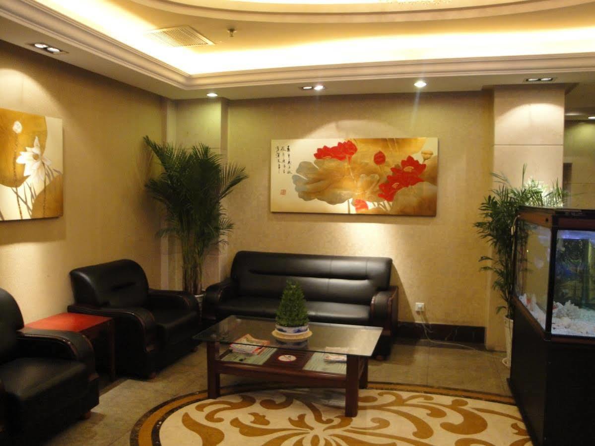 Overseas Chinese International Hotel ชิงเต่า ภายนอก รูปภาพ